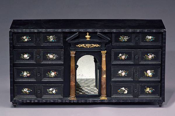 Appraisal: A Florentine Baroque pietra dura mounted ebonized table cabinet first