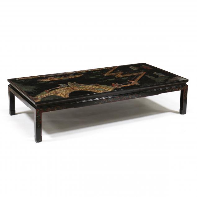 Appraisal: A CHINESE COROMANDEL STYLE LACQUERED LOW TABLE Second half th