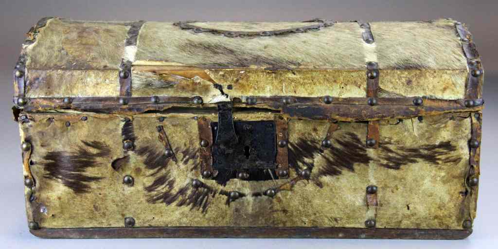 Appraisal: American Hide-covered Travelling ChestWith wood foundation covered with leather straps