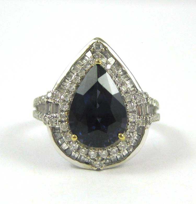 Appraisal: SPINEL DIAMOND AND FOURTEEN KARAT GOLD RING single pear-cut blue