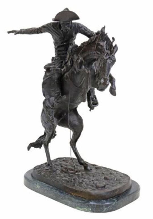 Appraisal: Large patinated bronze sculpture The Bronco Buster after the original