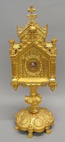 Appraisal: Architectural form surmounted by crucifix retractable cylinder at center with