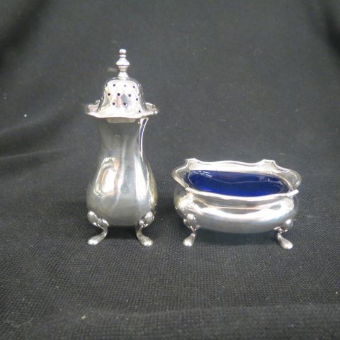 Appraisal: Sterling Silver Salt Pepper English footed cobalt lined salt and