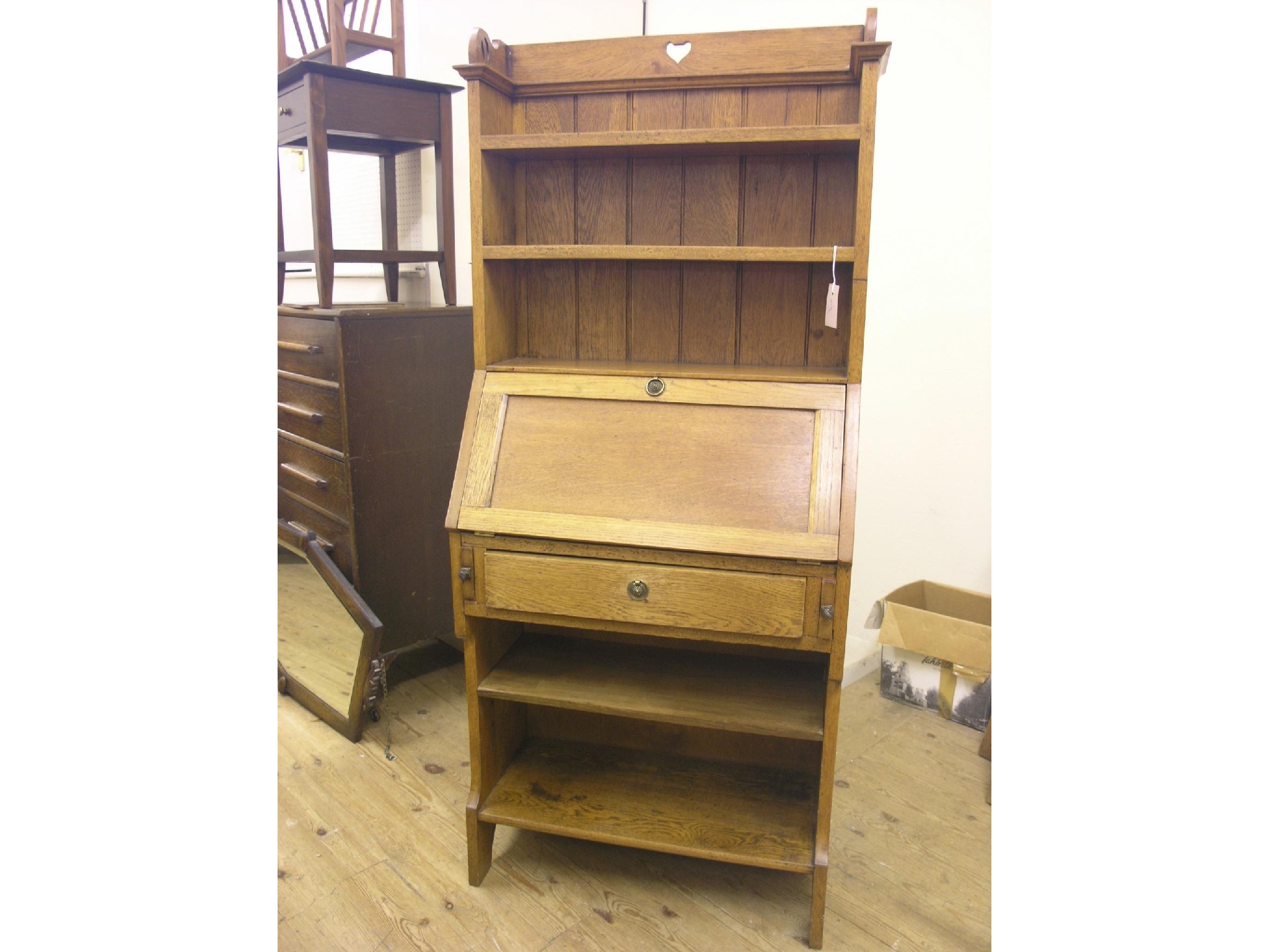 Appraisal: An early th century solid light oak bureau bookcase two