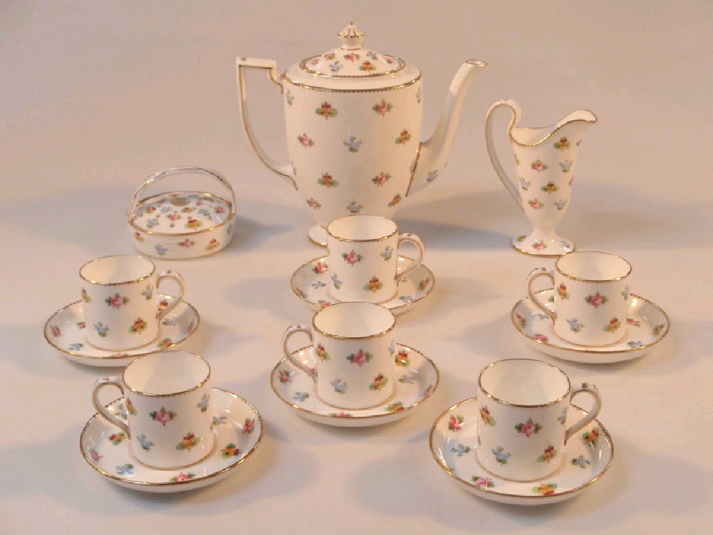 Appraisal: A Mintons floral coffee set comprising coffee pot cream helmet