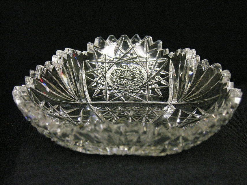 Appraisal: ABP CUT CRYSTAL DISH Hobstar and fan motif Condition Several