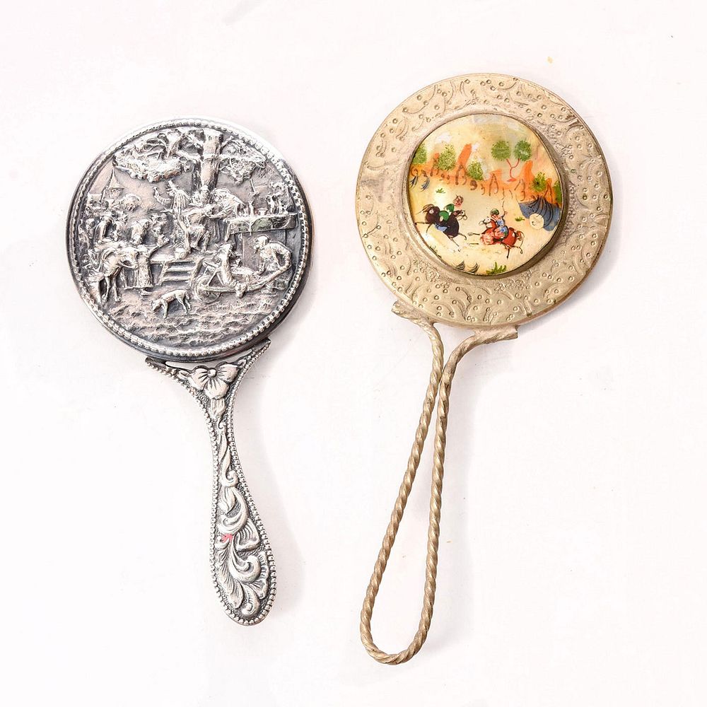 Appraisal: HAND MIRRORS DANISH SILVER AND ASIAN DESIGN repousse silver mirror