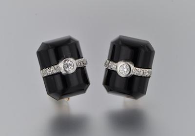 Appraisal: A Pair of Deco Onyx and Diamond Earclips k yellow