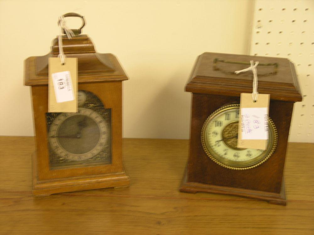 Appraisal: An Edwardian walnut cased bracket clock with enamelled dial and