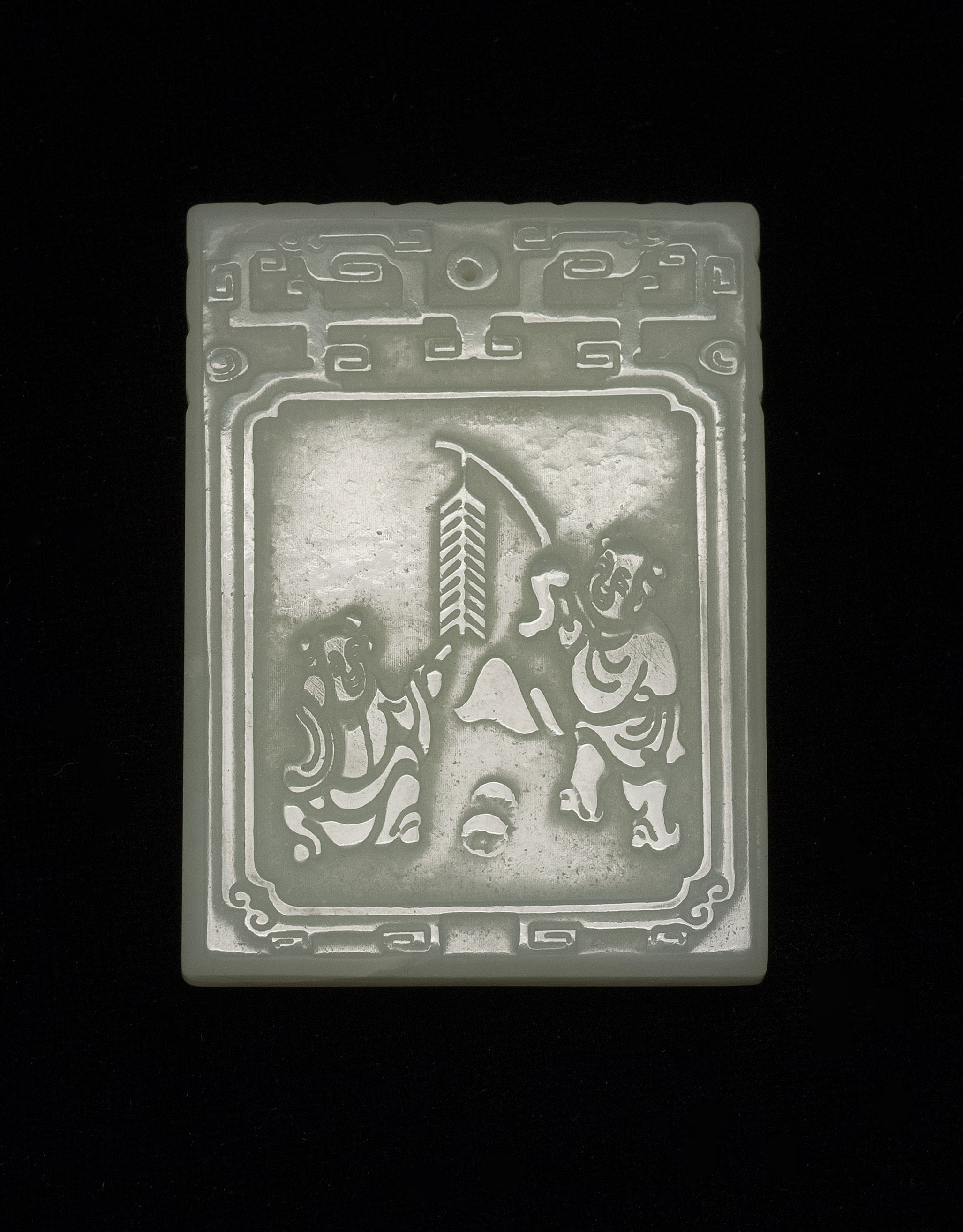 Appraisal: PALE CELADON JADE PENDANT In rectangular form Carved with children