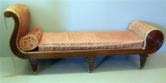 Appraisal: Regency mahogany day bed Scrolled and reeded ends on square