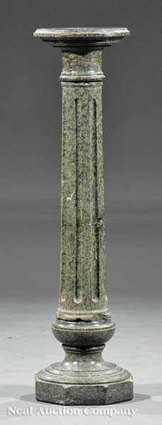 Appraisal: A Verde Antico Marble Pedestal circular top on fluted columnar