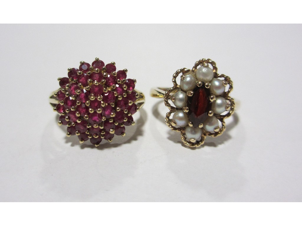 Appraisal: Two ct gold cluster rings one with rubies the other