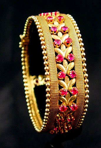 Appraisal: K GOLD AND RUBY BRACELET K yellow gold bracelet constructed