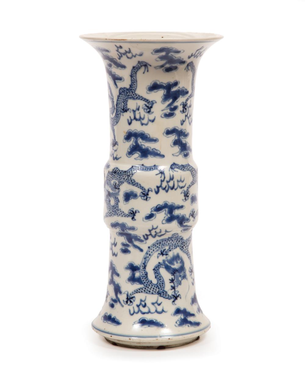 Appraisal: Chinese Blue and White Porcelain Gu Vase decorated with dragons