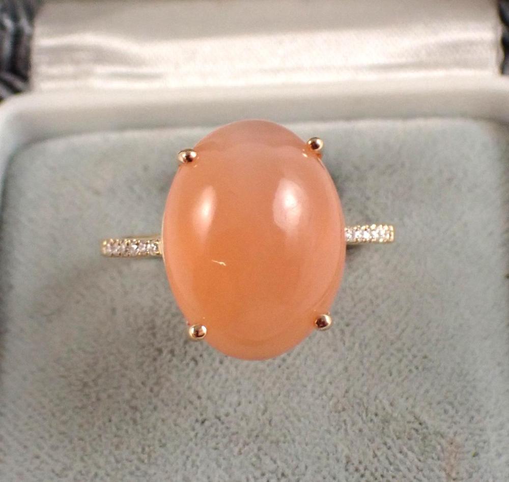 Appraisal: PEACH CAT'S EYE MOONSTONE AND DIAMOND RING The k yellow