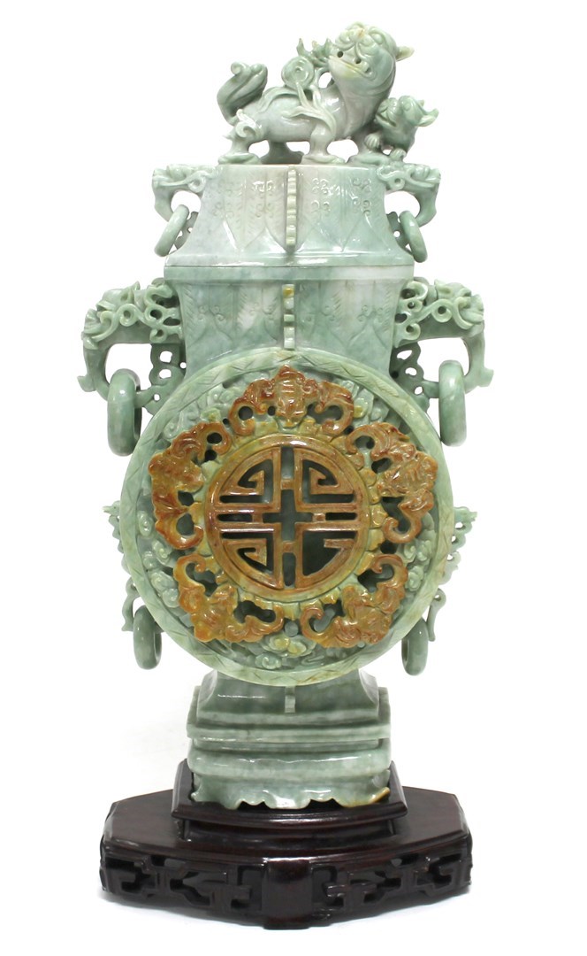 Appraisal: A pale green jade vase and cover th century of