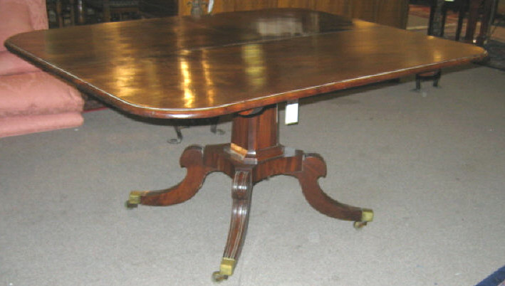 Appraisal: ENGLISH TH CENTURY MAHOGANY BREAKFAST TABLE Rectangular molded top hinged