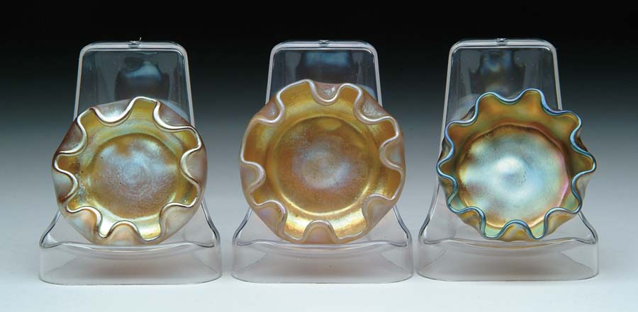 Appraisal: THREE TIFFANY SALTS Lot consists of three gold favrile salts