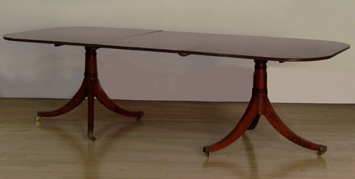 Appraisal: Georgian style two-pediment dining table with one leaf h x