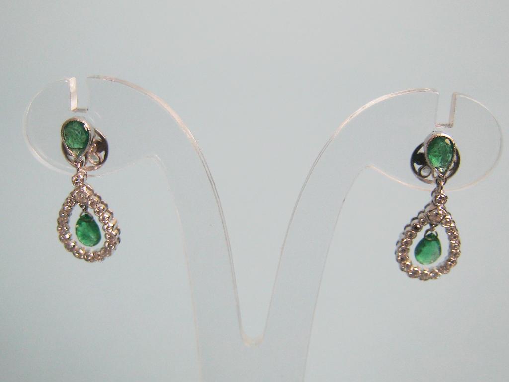 Appraisal: A pair of Emerald and Diamond Ear Pendants each with