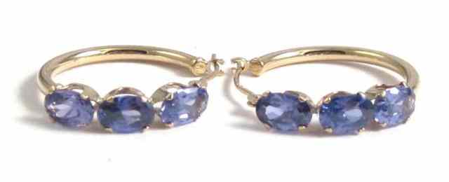 Appraisal: PAIR OF TANZANITE HOOP EARRINGS each k yellow gold set