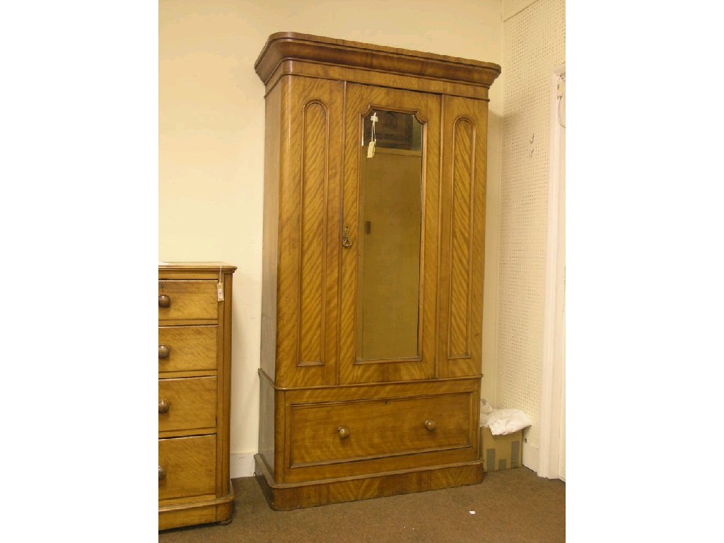 Appraisal: A late Victorian satin-birch wardrobe enclosed by three-quarter length mirror