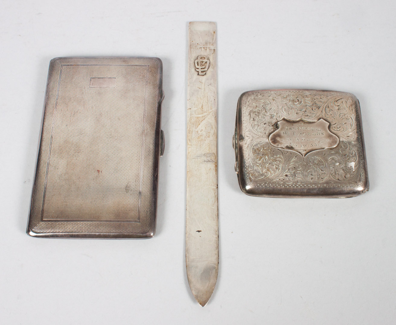 Appraisal: Two continental silver personal articles including an English engraved cigarette