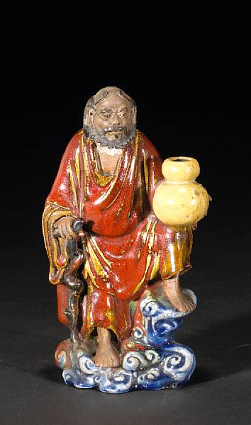 Appraisal: A polychrome enameled Shekwan pottery figure Late Qing Dynasty Depicting