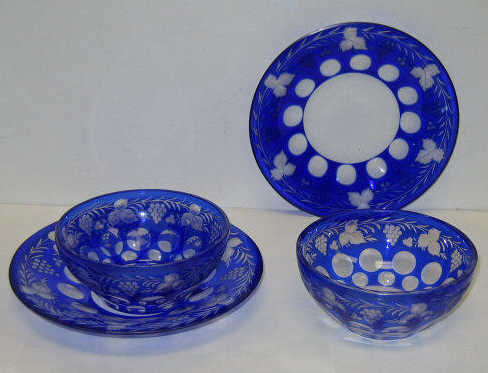 Appraisal: FOUR PIECES BOHEMIAN BLUE OVERLAY GLASS Cut to clear glass