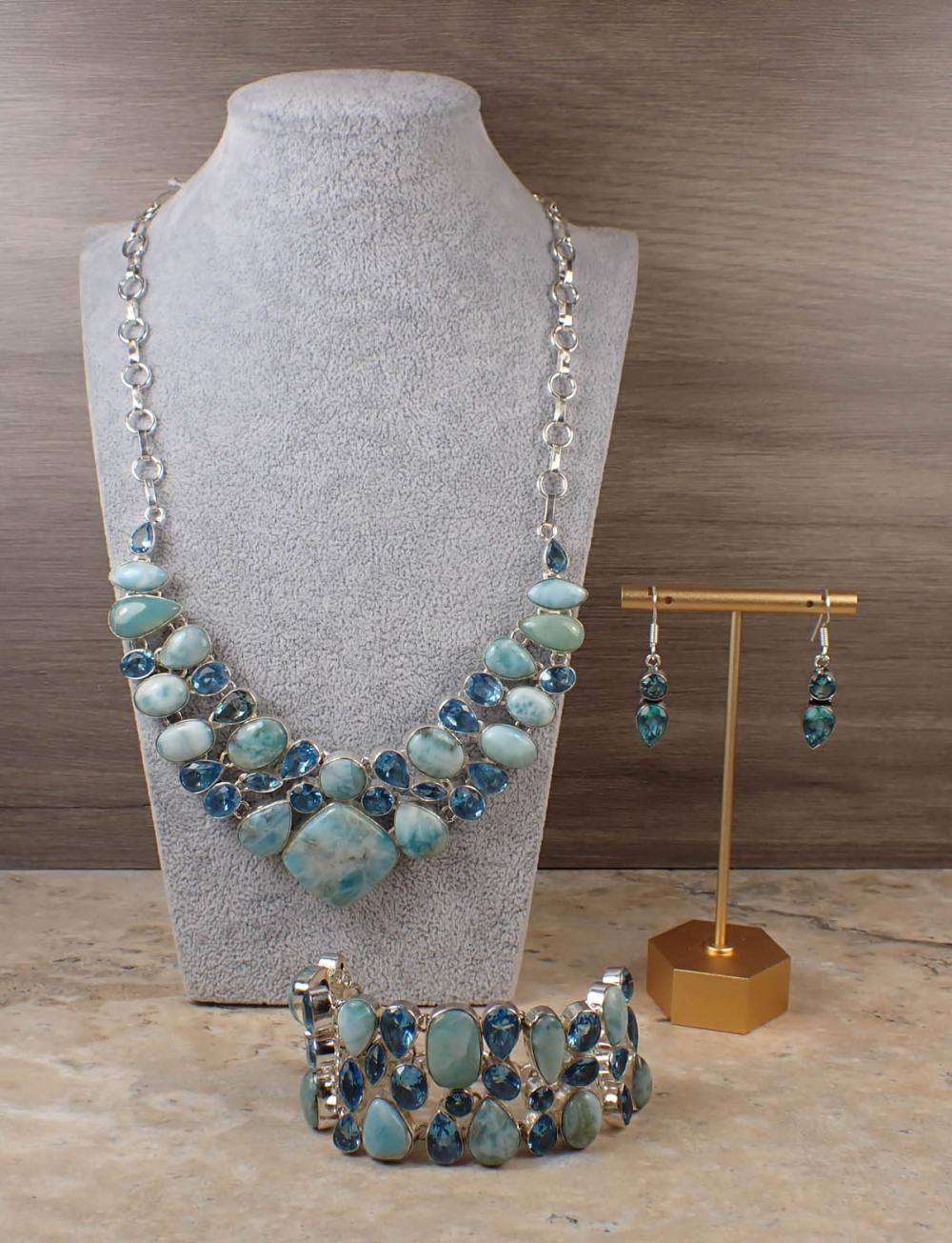 Appraisal: BLUE TOPAZ AND LARIMAR JEWELRY SET pieces including a adjustable