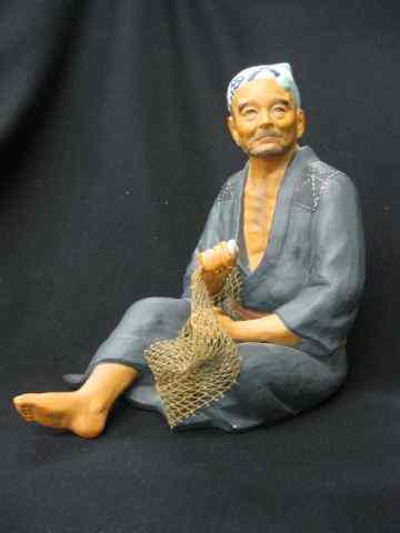 Appraisal: Oriental Pottery Figurine of Seated Fishermanrepairing his net '' excellent