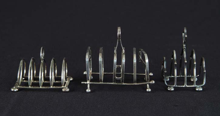 Appraisal: THREE SILVER TOAST RACKS Chester Marked G N R H