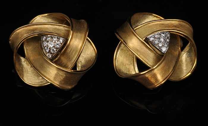 Appraisal: PAIR OF GOLD MOBIUS STRIP EARRINGS WITH PAV DIAMONDS Stamped