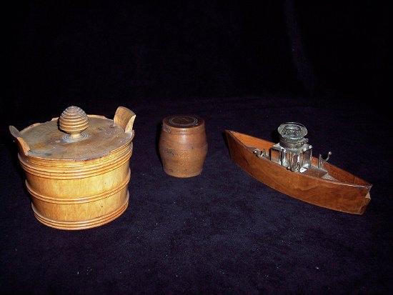 Appraisal: A treen pot of butter churn form with turned finial