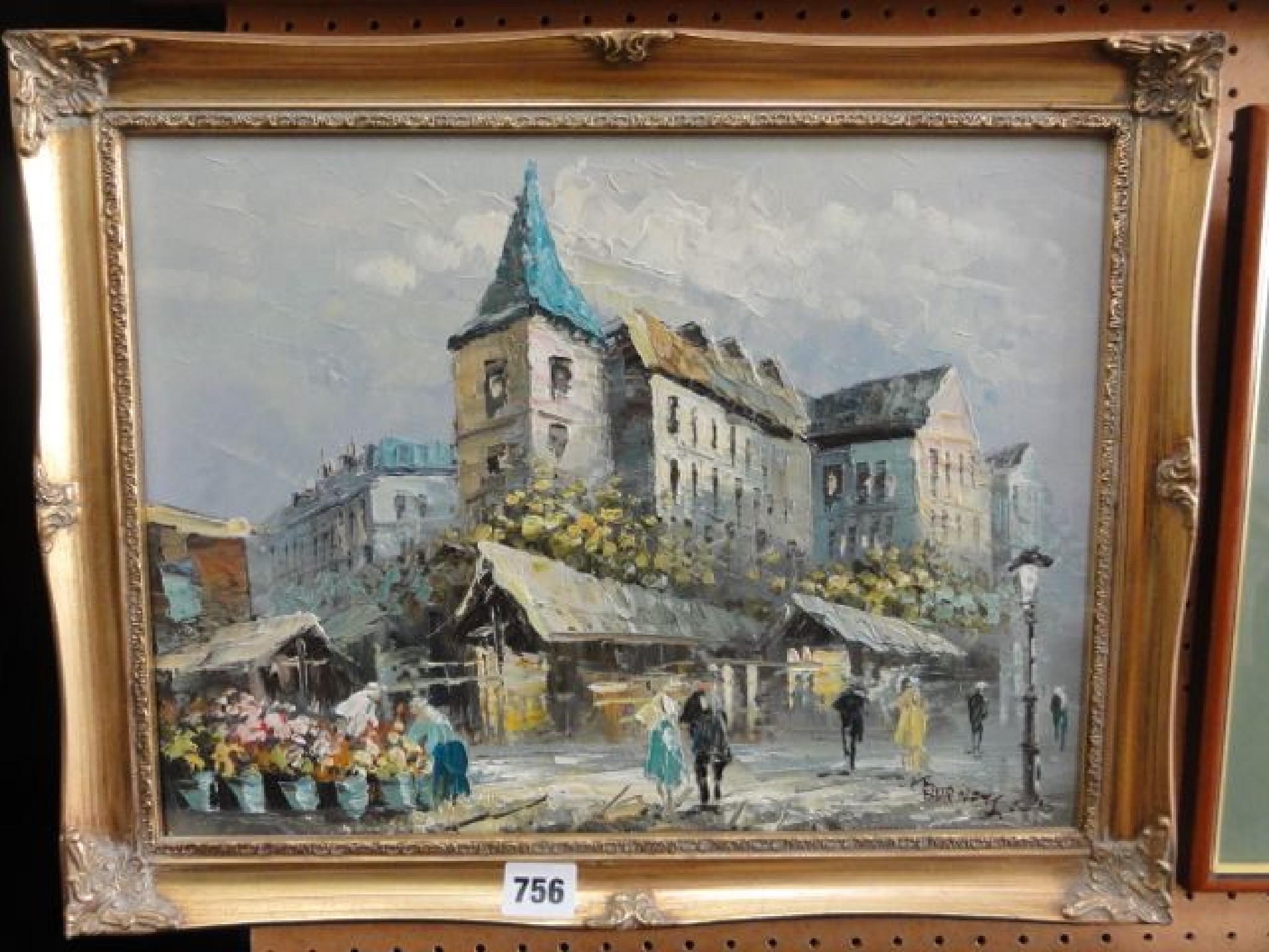 Appraisal: An oil painting on canvas of a Parisian street scene