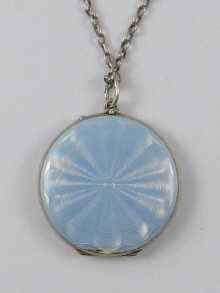 Appraisal: A blue guilloche enamelled silver locket on chain