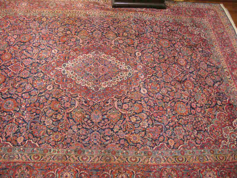 Appraisal: Persian Room Size Rug Kashan ca s red field with