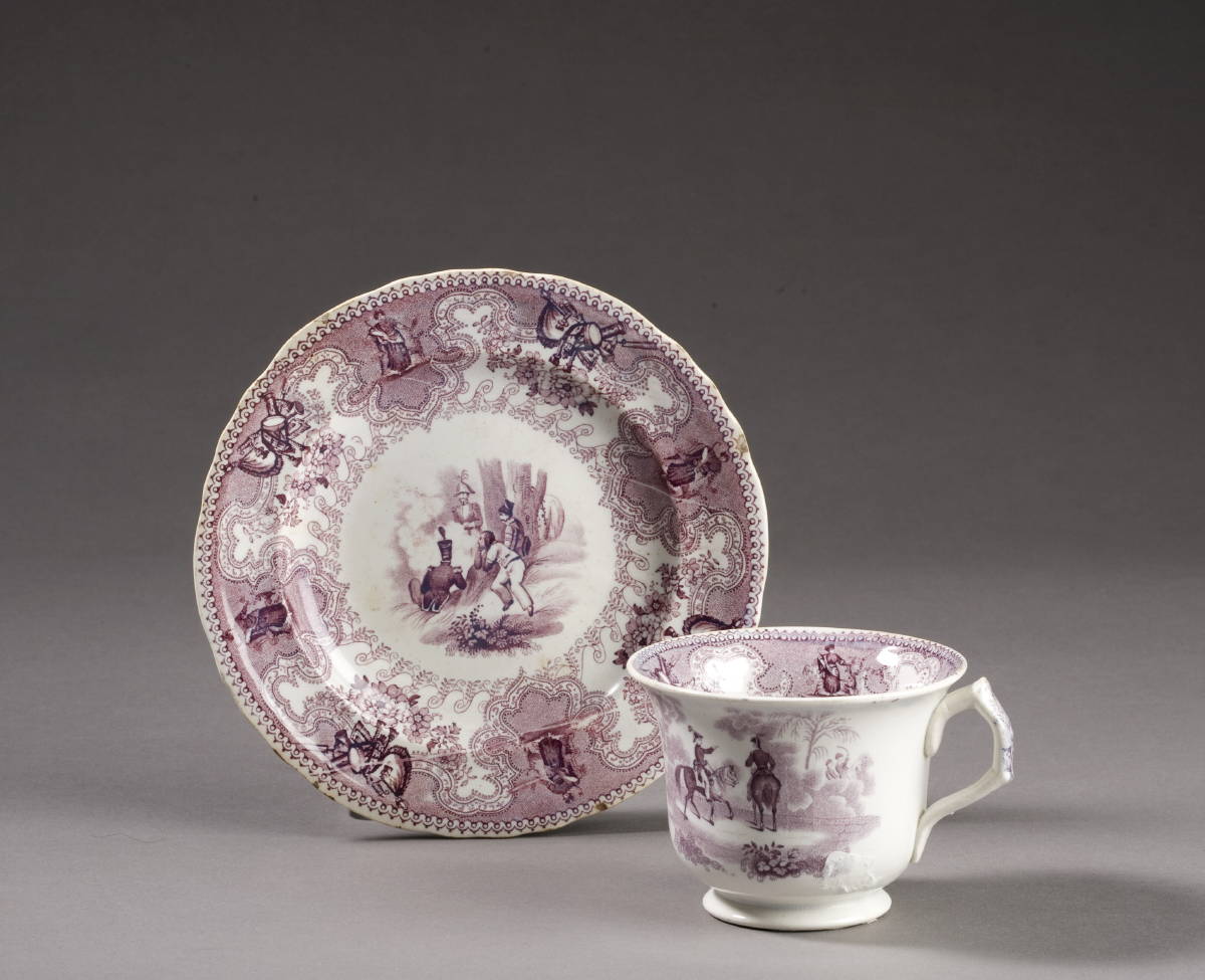 Appraisal: TEXIAN CAMPAIGNE STAFFORDSHIRE PURPLE TRANSFER-PRINTED CUP AND SAUCER JAMES BEECH