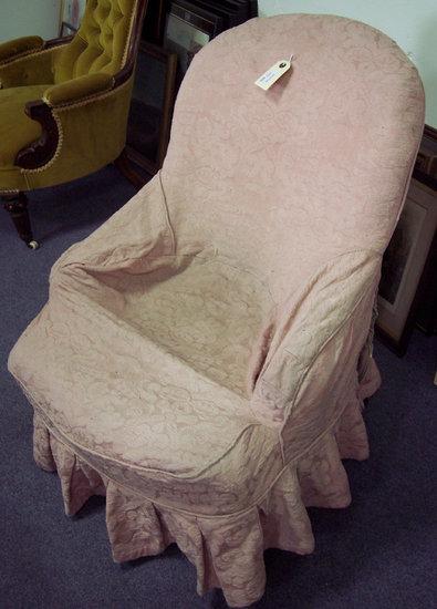 Appraisal: A Victorian upholstered chair on turned front legs