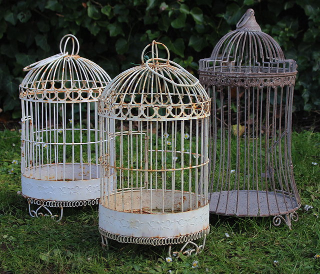 Appraisal: A PAIR OF WHITE PAINTED WIRE WORK CYLINDRICAL BIRD CAGES