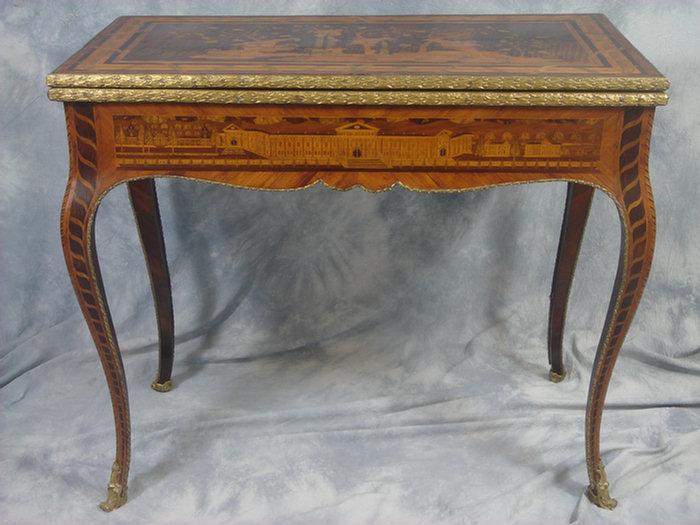 Appraisal: Louis XV marquetry inlaid game table with expansive architectural views