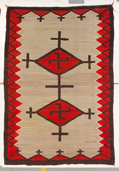 Appraisal: A Navajo rug With whirling logs centered within a double