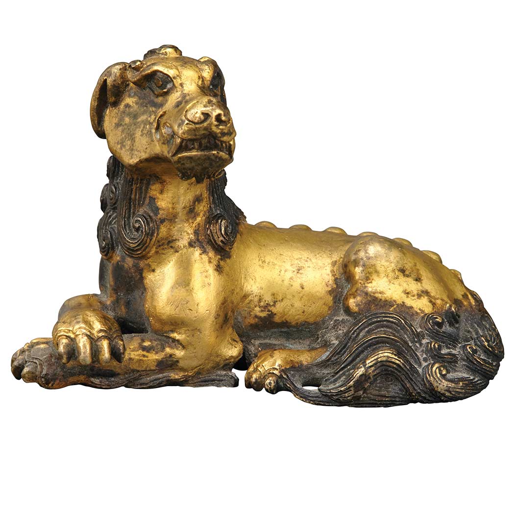 Appraisal: Chinese Gilt-Bronze Figure of a Recumbent Qilin Probably late Ming