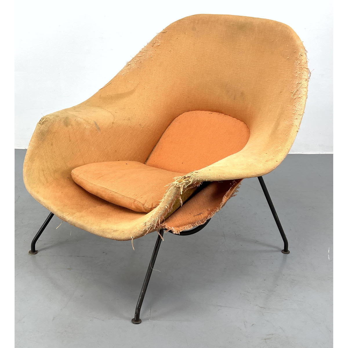 Appraisal: Early Eero Saarinen Womb chair by KNOLL Orange Dimensions H