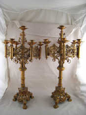 Appraisal: A pair of Victorian Gothic style bronze finish candelabra each