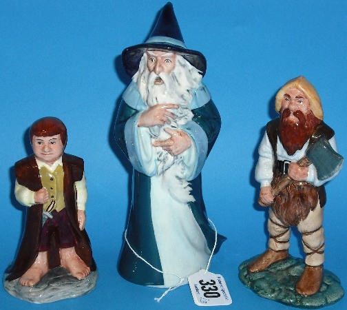 Appraisal: Royal Doulton Middle Earth Figures Gandalf HN Bilbo HN and