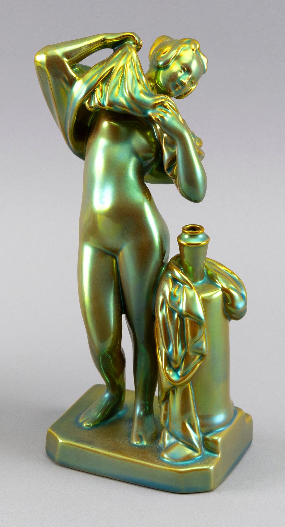 Appraisal: ZSOLNAY EOSIN-GLAZED EROTIC FIGURE HUNGARY TH CENTURY HEIGHT ZSOLNAY EOSIN-GLAZED