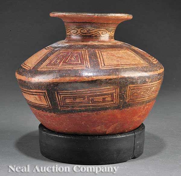 Appraisal: A Pre-Columbian Pottery Vessel Peru paint decorated compressed globular body