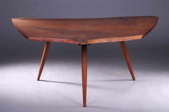 Appraisal: GEORGE NAKASHIMA WALNUT LOW TABLE Made in Butterfly-wedge asymetrical crescent